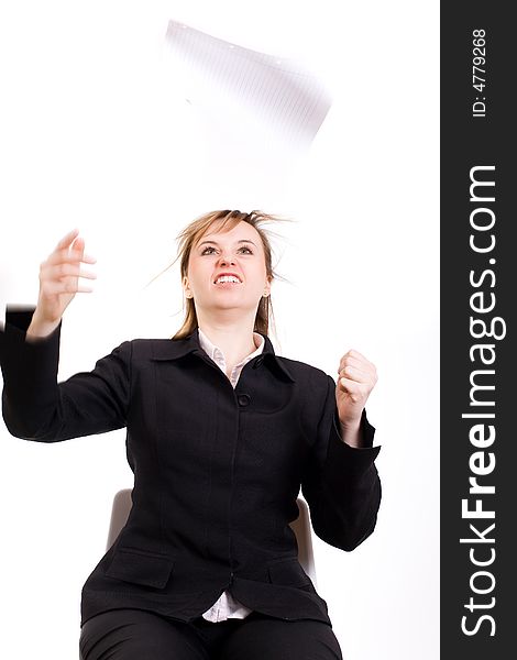 Angry businesswoman throwing sheet of paper