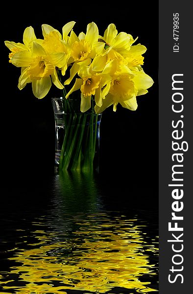 Bouquet Of Narcissuses In A Transparent Vase