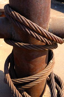 Rusty Steel Rope With Bollard Stock Photography