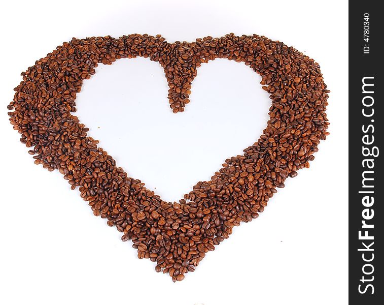 Coffee beans in a heart form isolated