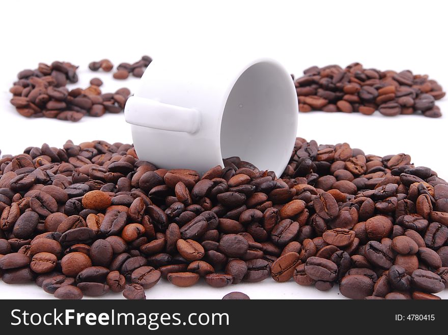 Fragrant fried coffee beans isolated