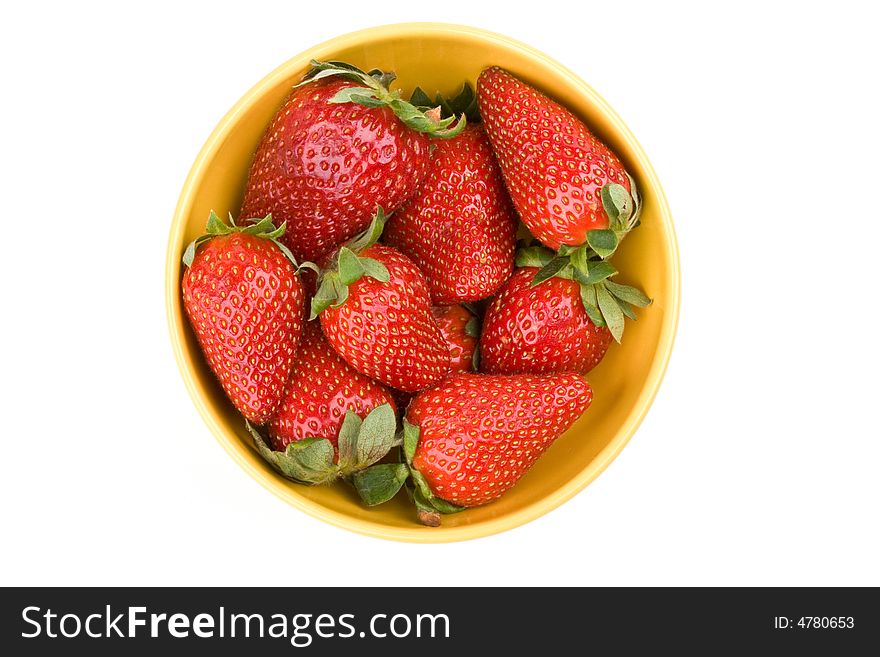 Strawberries on a yellow bowl. Strawberries on a yellow bowl