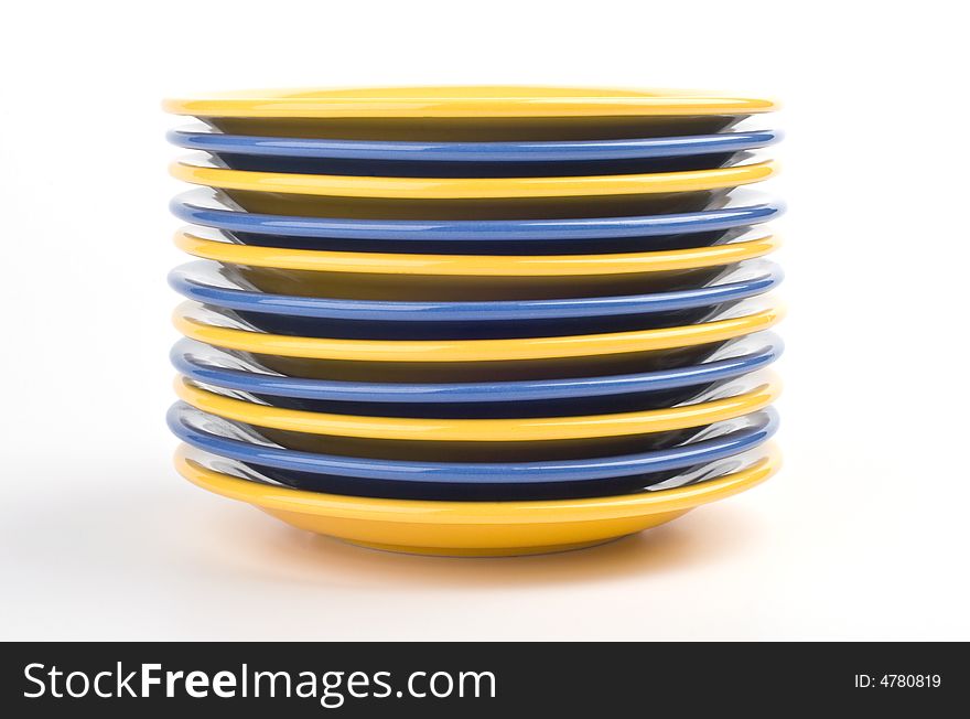 Yellow and blue porcelain plates. Yellow and blue porcelain plates