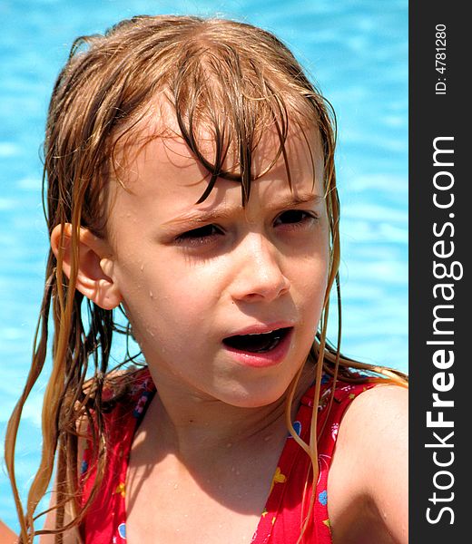 This is my daughter comng out of the pool all wet in florida wth a funny look on her face. This is my daughter comng out of the pool all wet in florida wth a funny look on her face