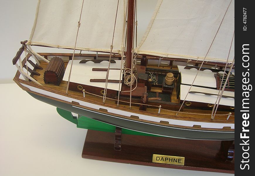 Close up of the back of a green detailed sail-boat model named Daphne. Close up of the back of a green detailed sail-boat model named Daphne