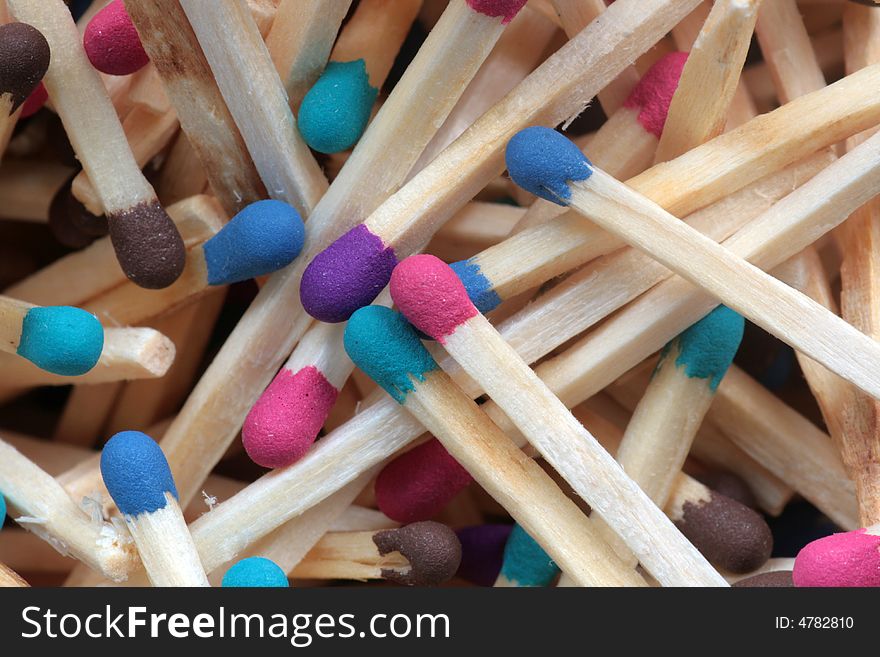 Wooden matches of different colors. Wooden matches of different colors.