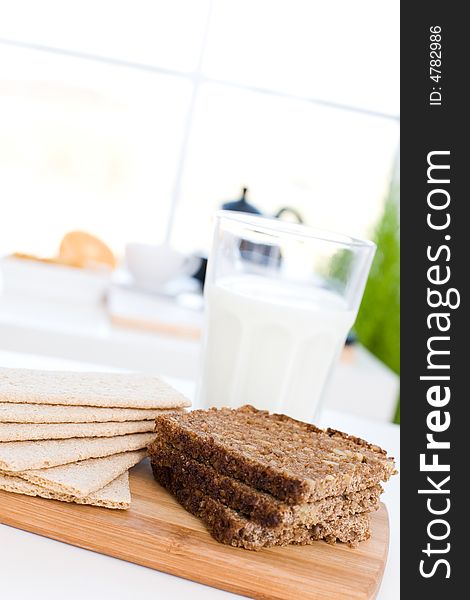 Healthy breakfast / Milk, wholemeal bread and crack bread. Healthy breakfast / Milk, wholemeal bread and crack bread