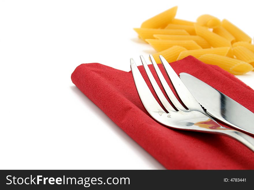 Fork And Knife On Red Napkin