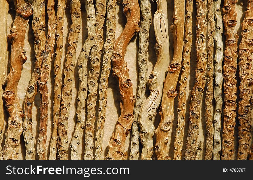 Close up of dinner mat made of dried roots.