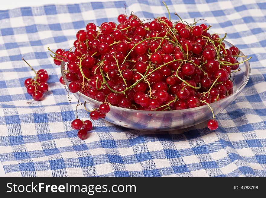 Fruit serias: red currant in the glass bowl