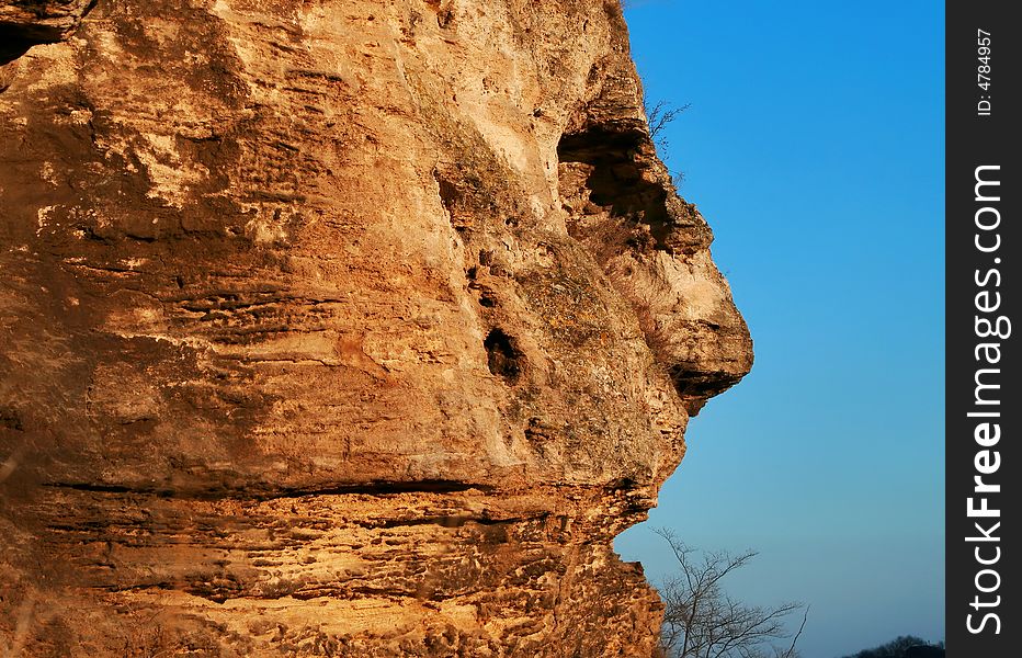Person in a stone-natural a miracle on one of mountains in Crimea