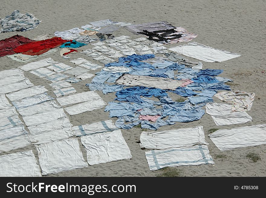 Clothes drying on sand