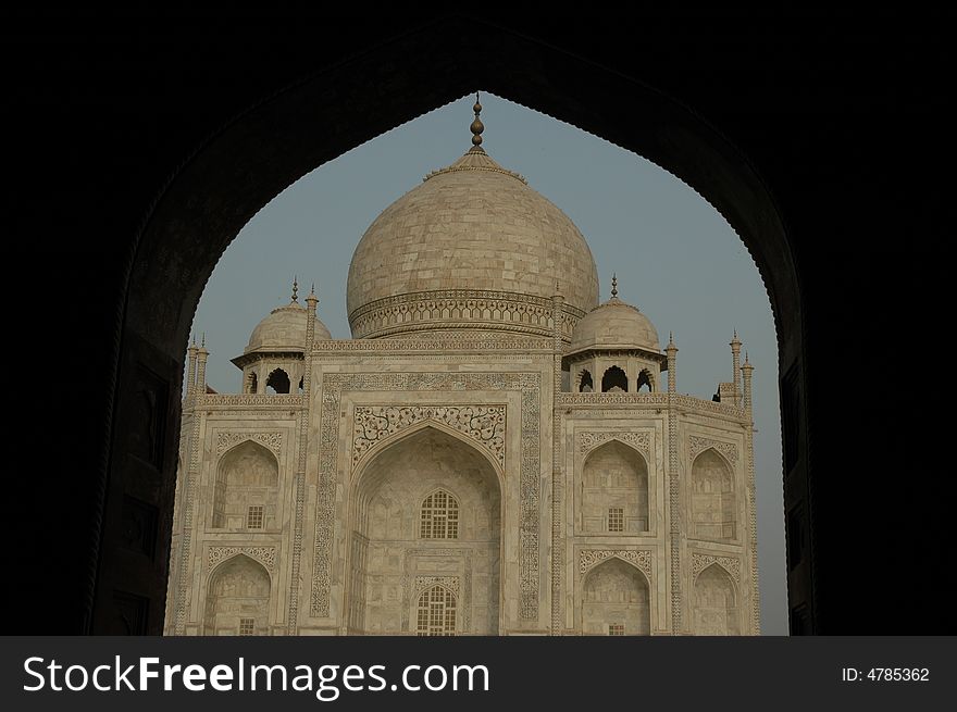 Taj Mahal viewed through arch at entrance