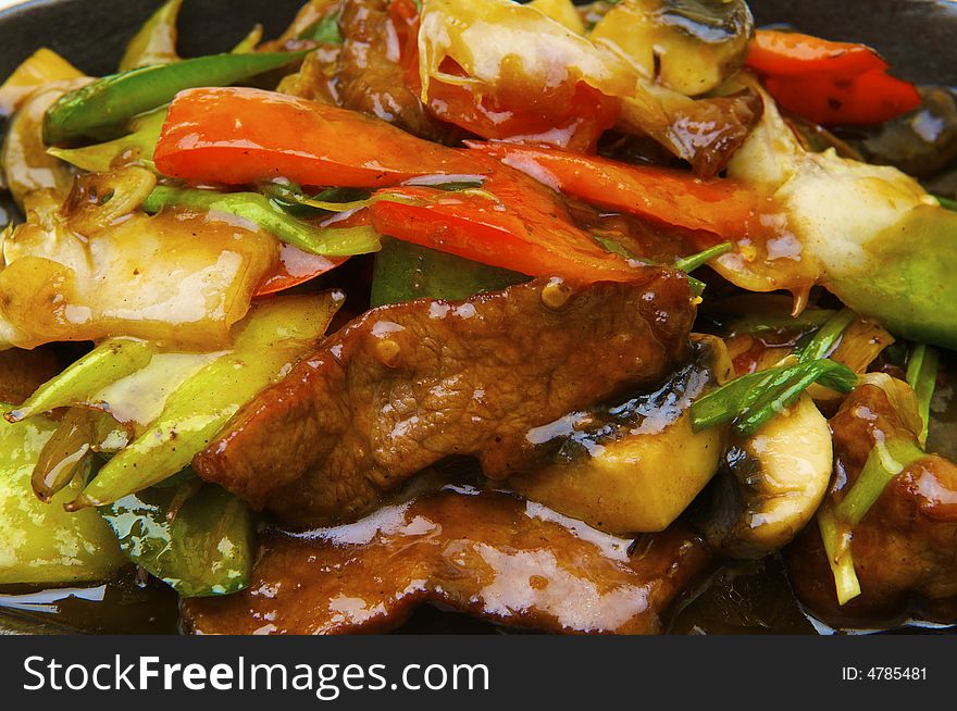 Fried meat with the vegetables and the specific sauce