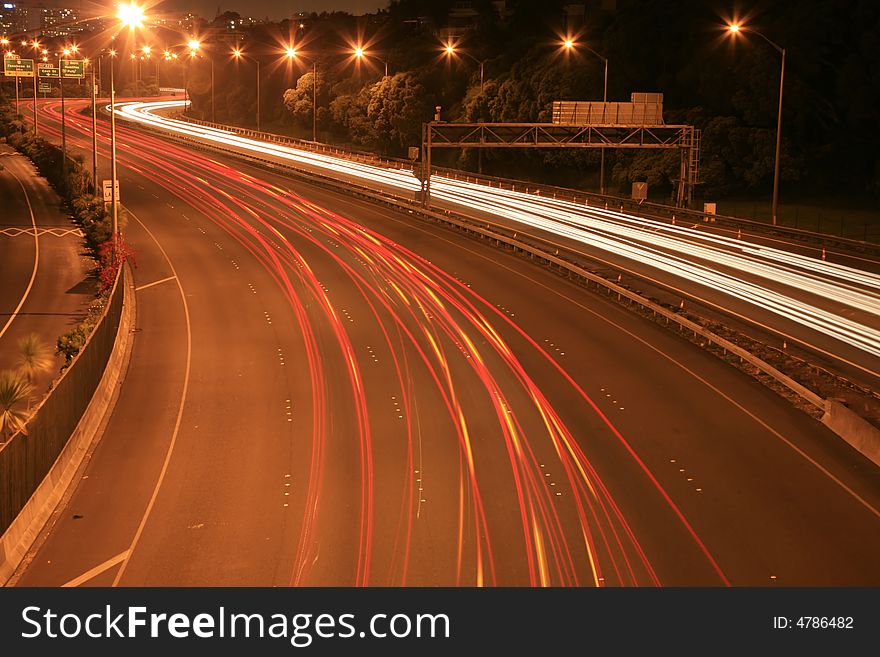 Motion Blur of car lights during evening traffic. Motion Blur of car lights during evening traffic