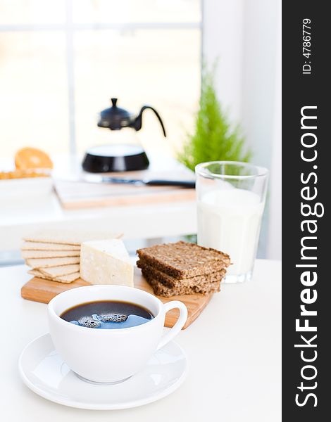 Delicious breakfast / Black coffee, cheese, wholemeal bread, milk