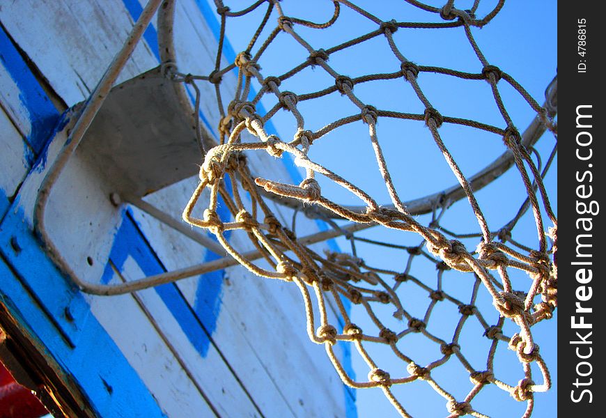 Metal basketball's basket with ropes closeup. Metal basketball's basket with ropes closeup