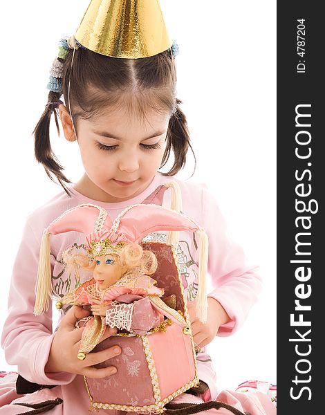 The little girl with a doll isolated on a white background