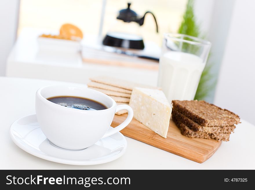 Delicious breakfast / Black coffee, cheese, wholemeal bread, milk