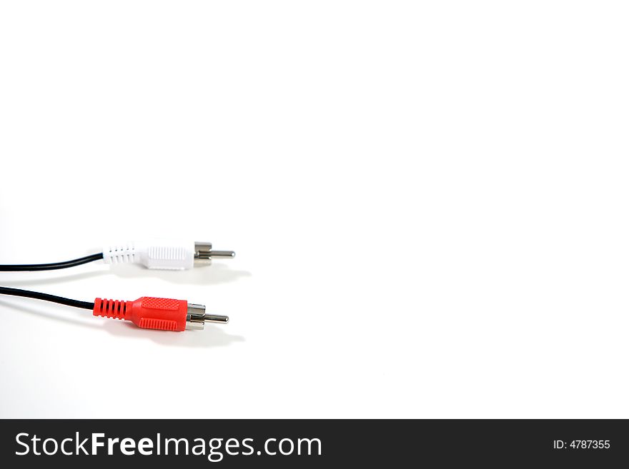 An audio cable in the studio on white background