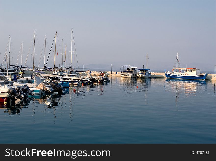 Old and new greek boats ashore in shipyard