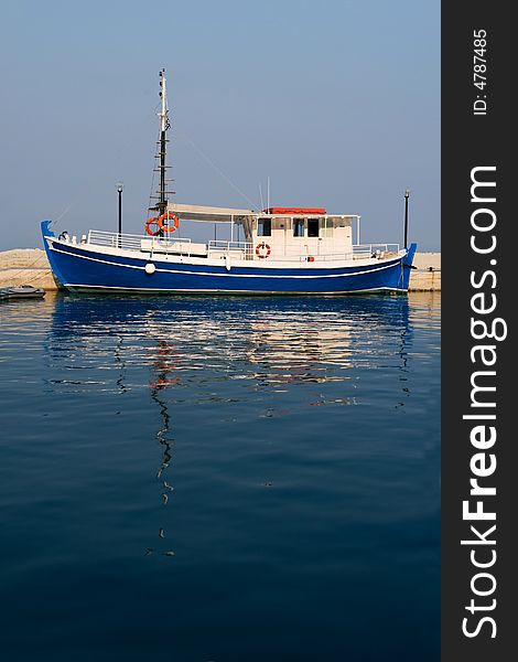 Blue boat in evening