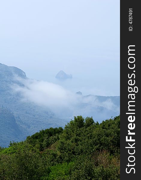 Cloudy sea in the summer near Corfu island shore line