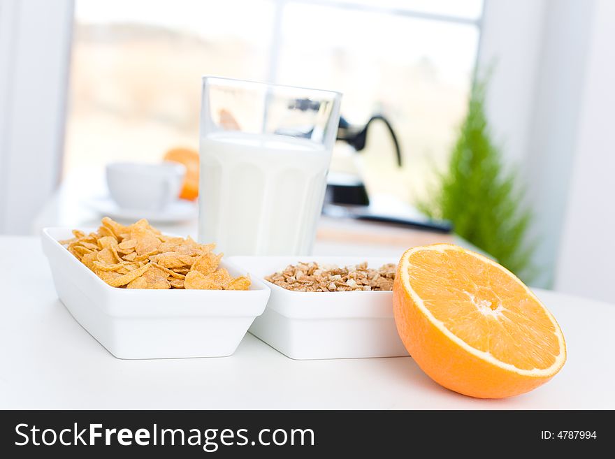 Delicious breakfast / Orange, cornflakes and milk. Delicious breakfast / Orange, cornflakes and milk