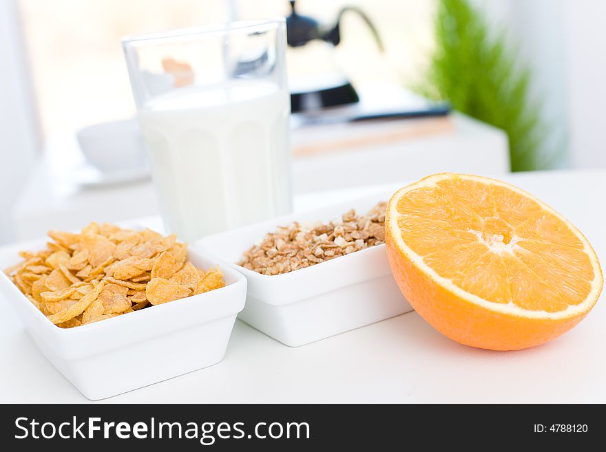 Delicious breakfast / Orange, cornflakes and milk. Delicious breakfast / Orange, cornflakes and milk