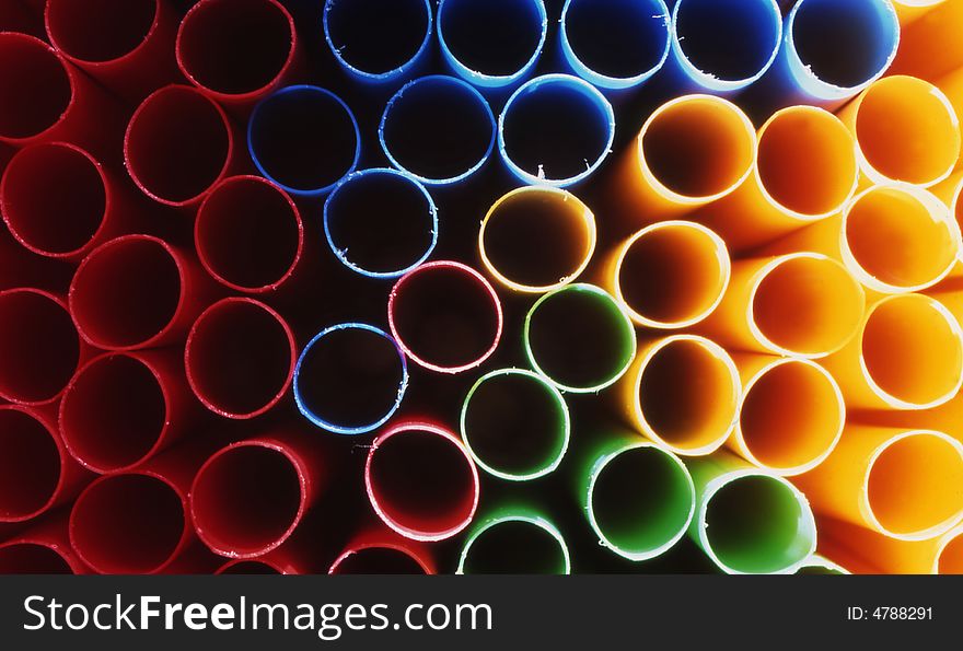 A close up with blue,yellow,green and red sticks