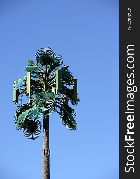 A modern communications tower made to look like a palm tree