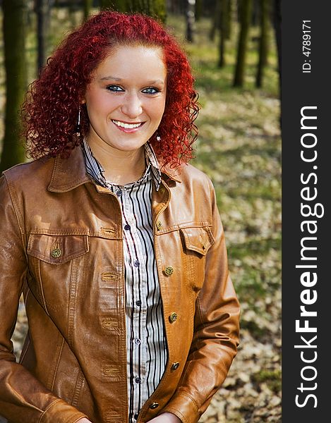 Beautiful young women smiled in forest