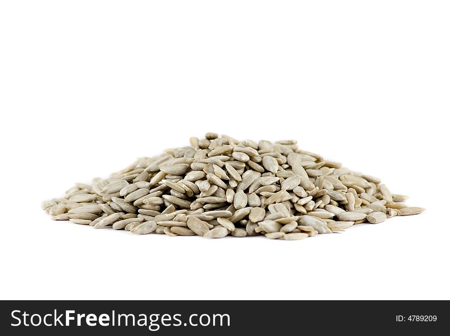 A Pile Of Sunflower Seeds Isolated On White