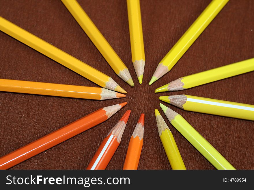 Set of color pencils in a hand of the girl. Set of color pencils in a hand of the girl