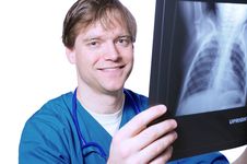 Male Doctor Looking At Xray Stock Images Male Doctor Looking At Xray Stock Images