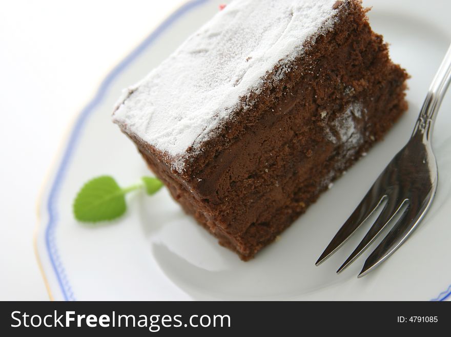 Chocolate cake on white background