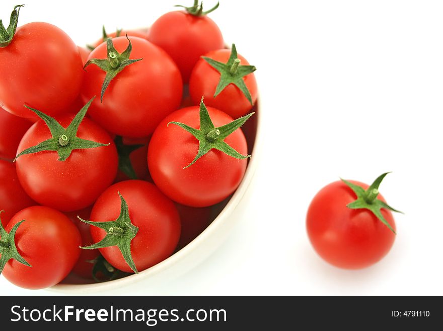 Red cherry tomatoes on white backgrund