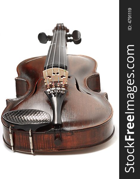 Looking down a violin at low angle with isolated background. Looking down a violin at low angle with isolated background.