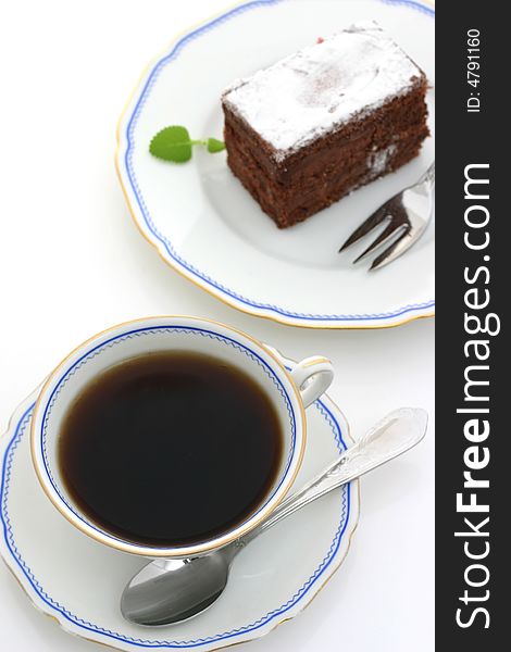 Cup of coffee and chocolate cake
