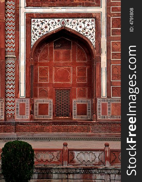 India, Agra: Taj Mahal; detail of one of the mosque's door; white and red stone. India, Agra: Taj Mahal; detail of one of the mosque's door; white and red stone