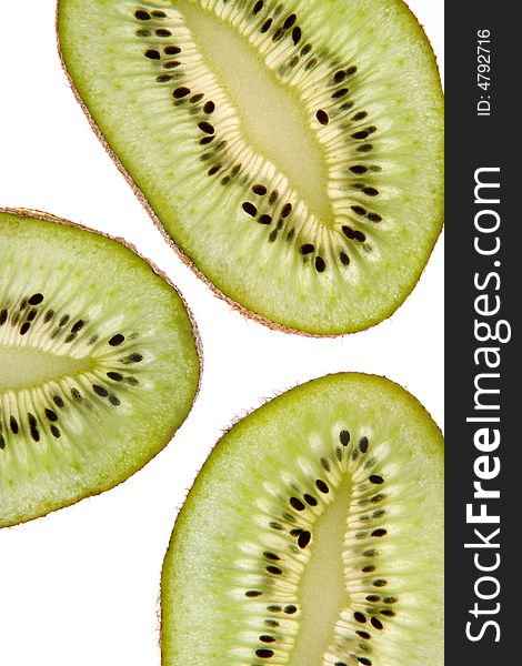 Ripe kiwi with seeds isolated on white