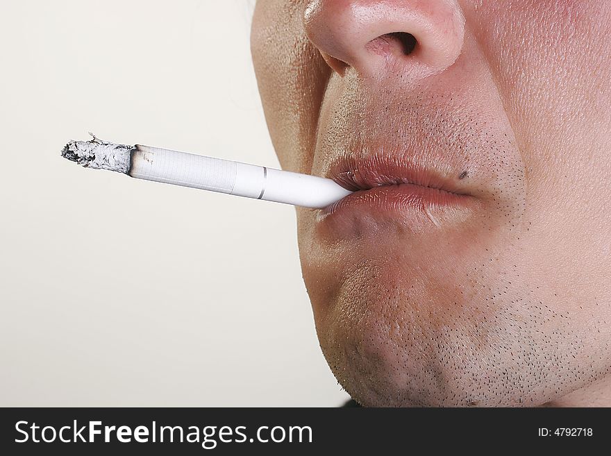 Man With Cigarette In Mouth