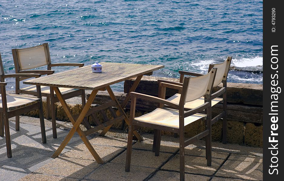 Table and chairs. Fish restaurant in Old Akko