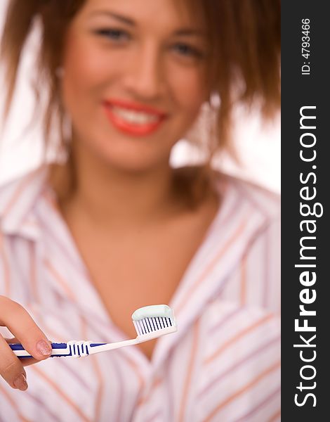 Beautiful Girl With Tooth-brush Isolated On White