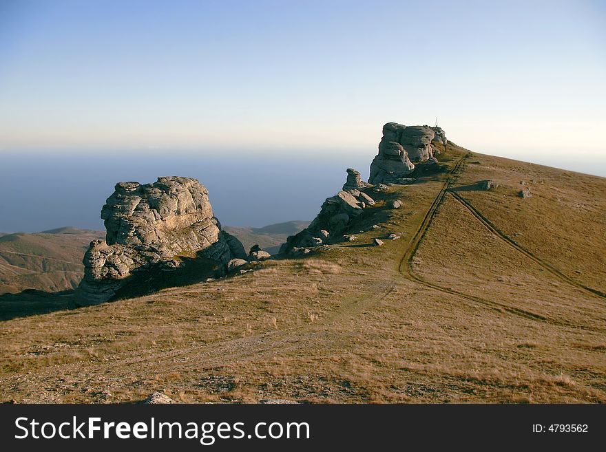 Stone formations, strange landscape on sky background