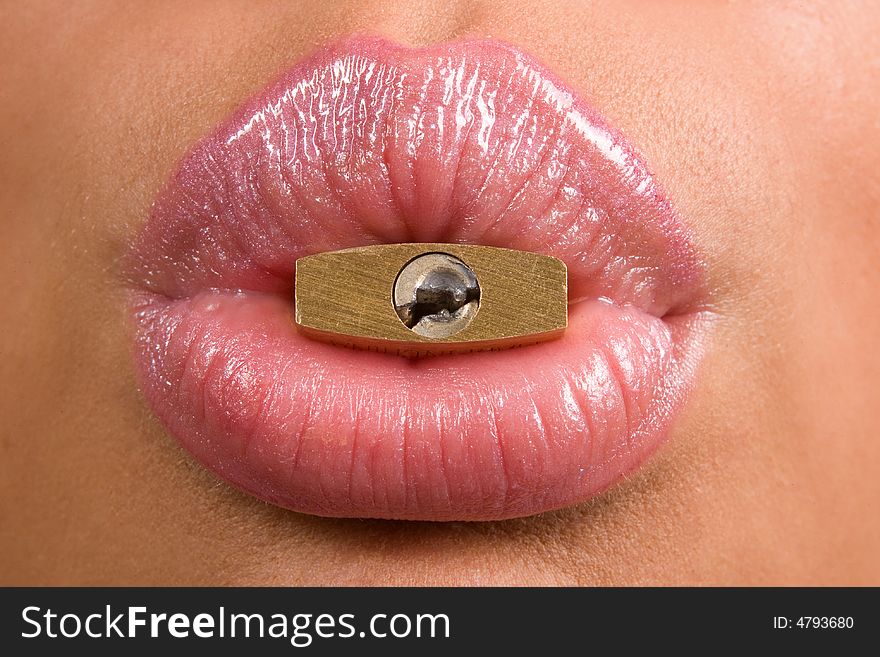 Close-up of woman's lips with padlock. Close-up of woman's lips with padlock