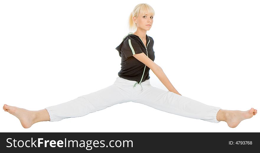 Beautiful young blondy doing yoga exercise