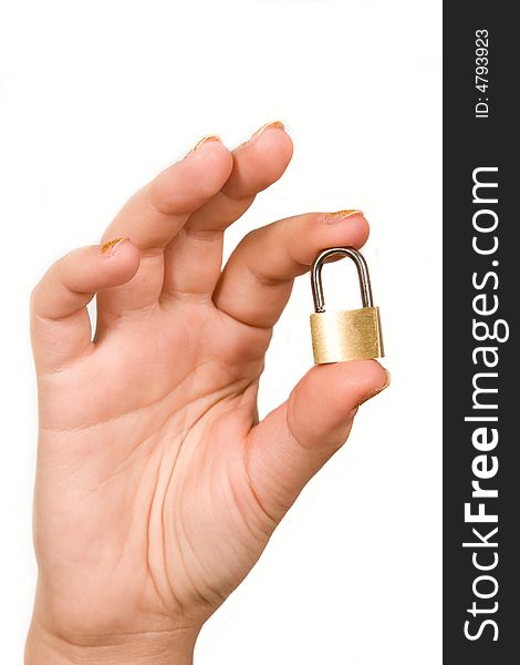 Small metal padlock in woman's fingers