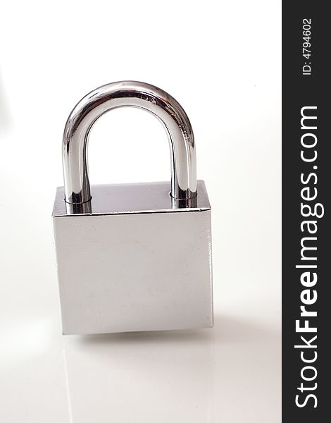 Metal Padlock Over White