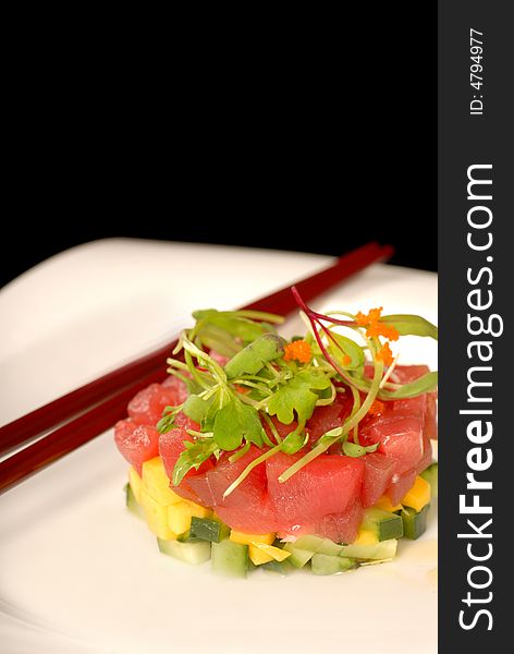 Asian seafood and mango appetizer with micro green salad. Asian seafood and mango appetizer with micro green salad